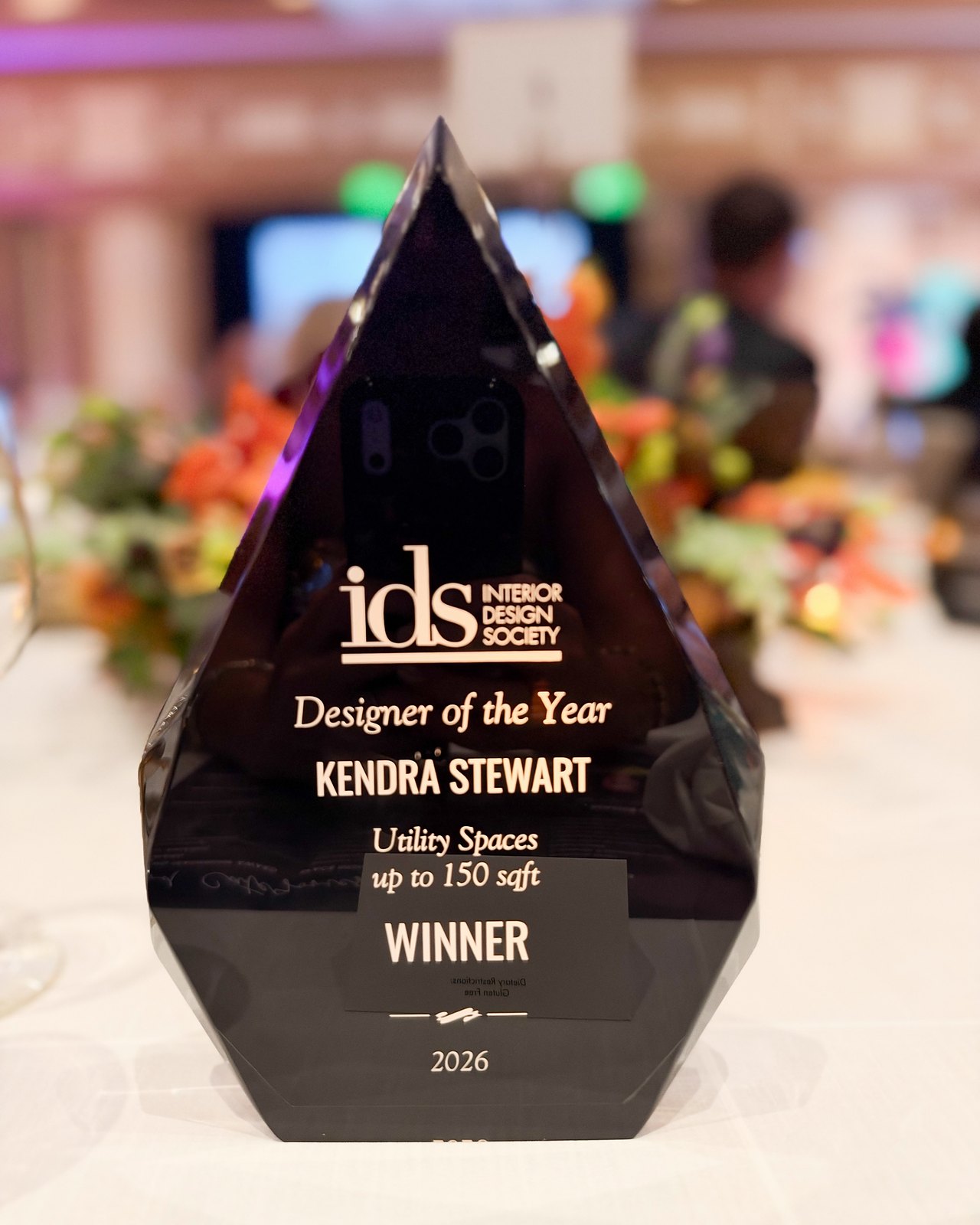 The 2026 IDS Designer of the Year award, engraved: Kendra Stewart, Winner, Utility Spaces up to 150 sq ft.