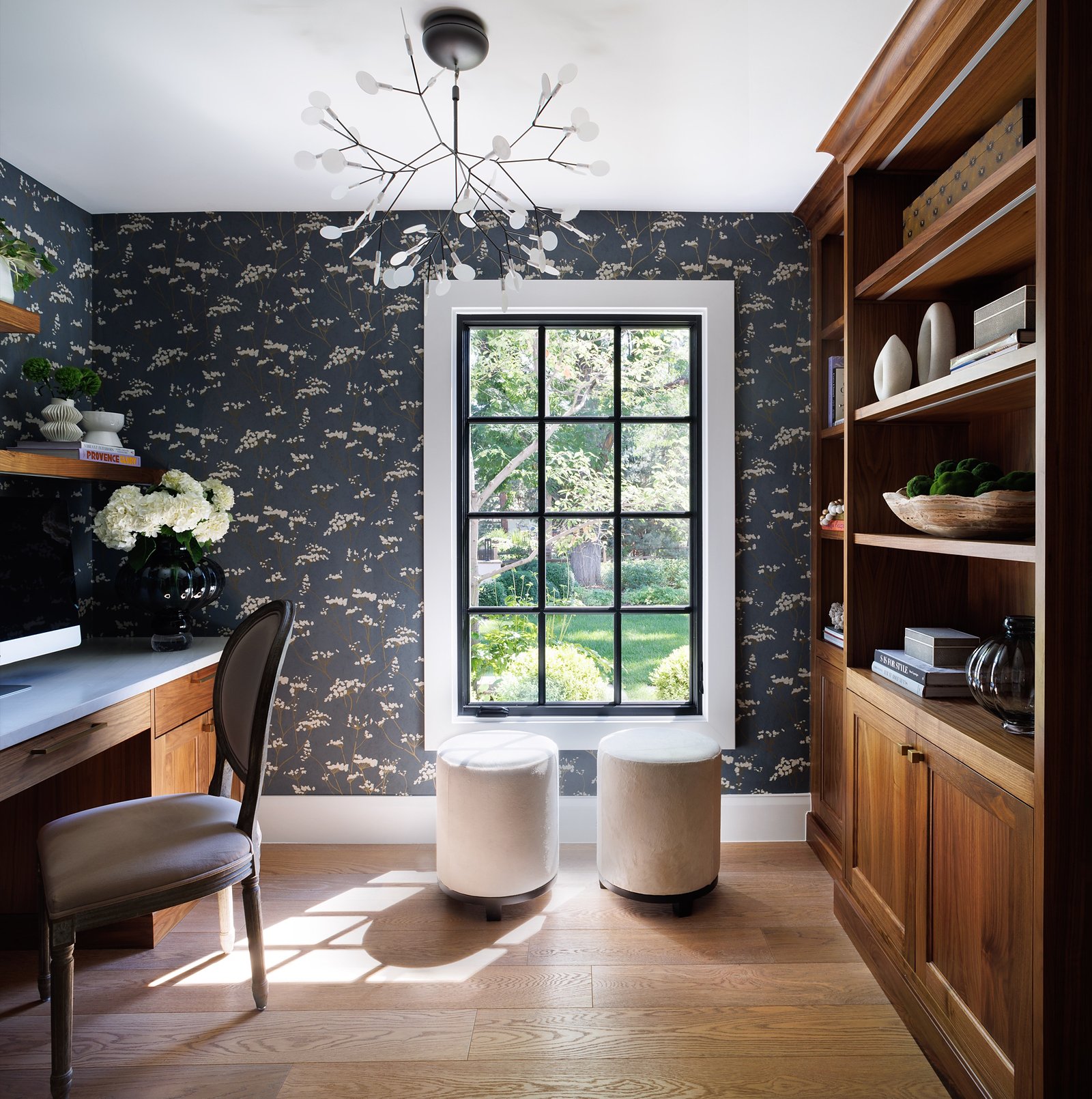 Home office with dark botanical wallpaper, walnut built-ins, and sputnik chandelier, Greenwood Village whole home renovation by E+E Design Consulting