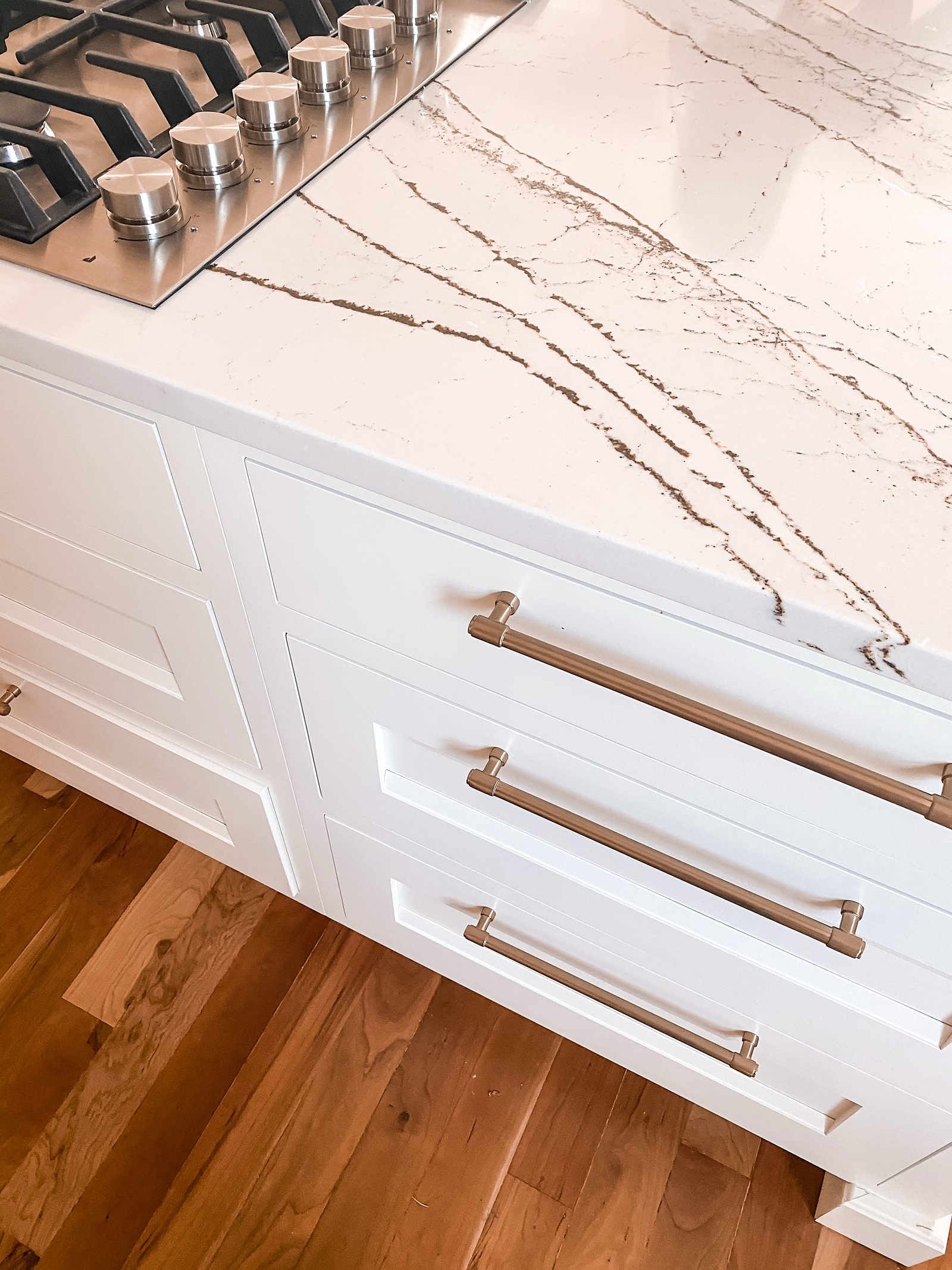 Waterfall counter edge and brass hardware detail, historic Colorado Springs kitchen remodel