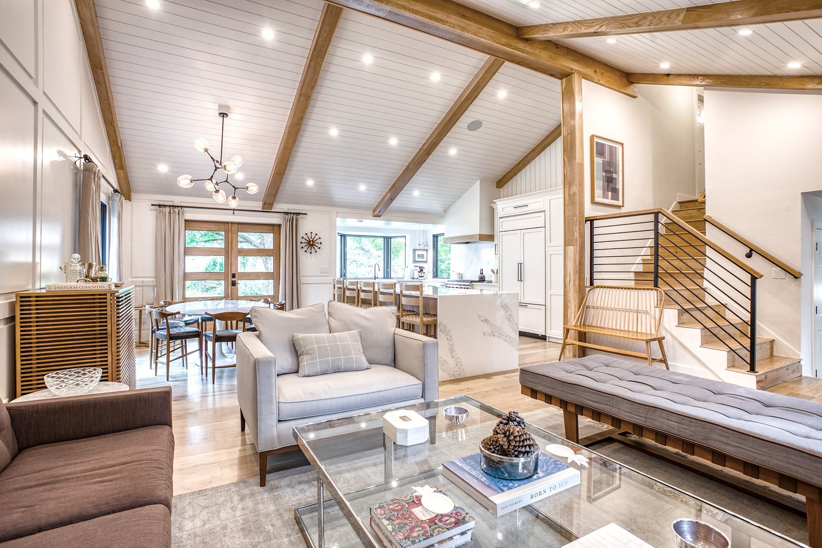 Family room with white paneling and comfortable mixed seating, Fulton Street whole house renovation in Greenwood Village