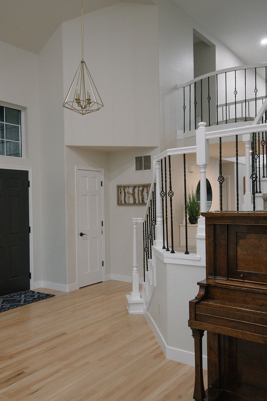 Living room with view to the home office through French doors, Stonegate main floor renovation in Parker, Colorado