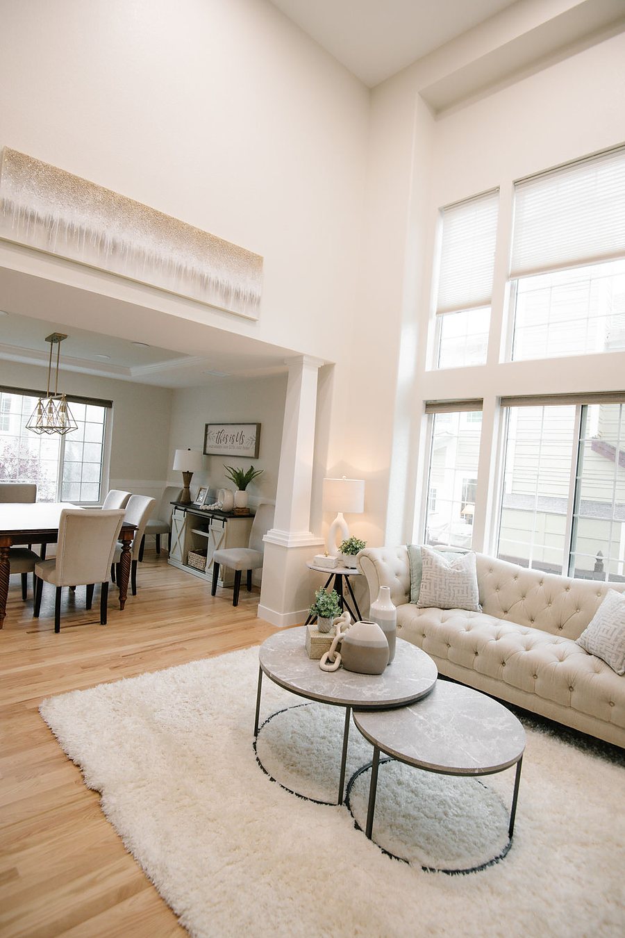 Dining room with wainscoting and airy drapery, Stonegate main floor renovation in Parker, Colorado