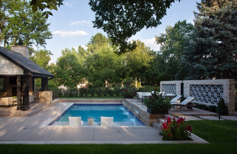 Pool and outdoor entertaining space at dusk designed for indoor-outdoor living